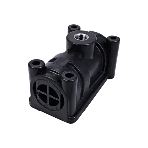 Black softwash pump component with threaded ports and intake grille for pressure washing systems
