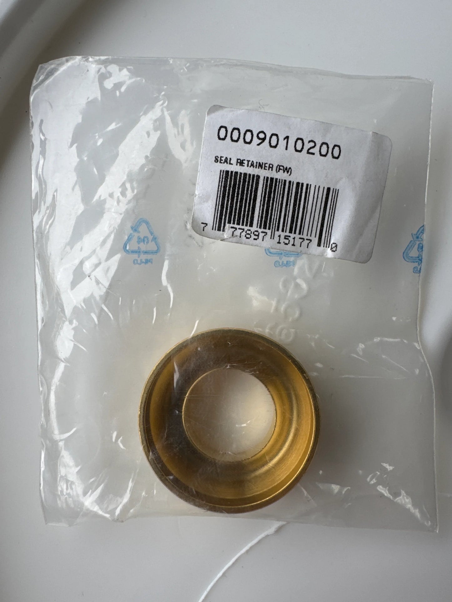 Seal retainer (FW) part for softwash equipment, model 0009010200, in clear packaging
