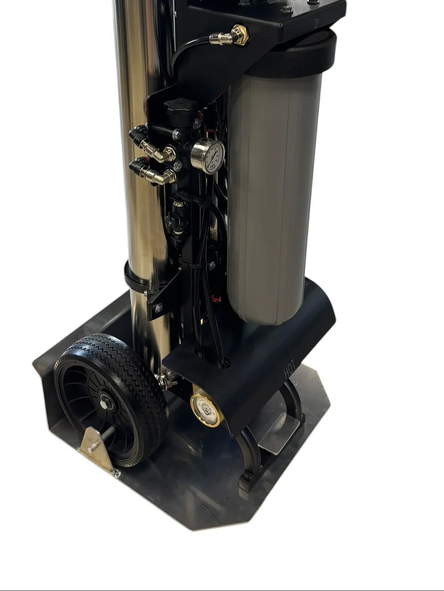 Professional softwash equipment with pressure gauge, hoses, and wheeled base for mobile cleaning solutions