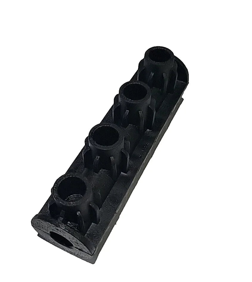 Black plastic softwash nozzle manifold with four ports for pressure washing equipment