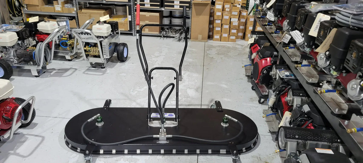 Softwash equipment with pressure washer setup in a warehouse for cleaning solutions