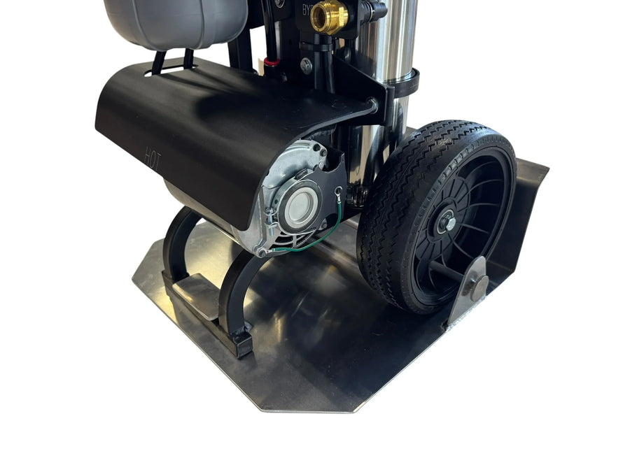 Professional softwash equipment with hot water heater, durable wheels, and stainless steel base for commercial cleaning.