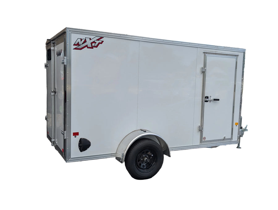 White enclosed utility trailer with NXT logo, ideal for softwash equipment transport and storage.