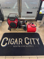 Honda GX690 softwash equipment with red fuel tank, displayed near Cigar City Softwash Supply mat