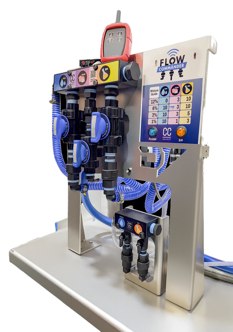 Flow Commander softwash equipment with digital controls and blue hoses for precise cleaning solutions