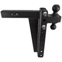 Black heavy-duty trailer hitch with dual ball mounts for towing equipment