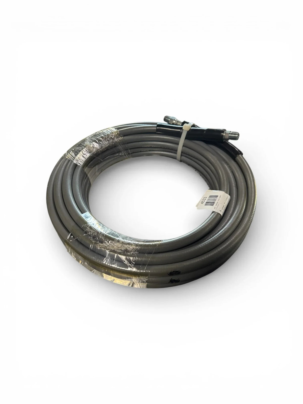 Coiled gray softwash hose with metal fittings, wrapped for shipping, ideal for pressure washing equipment.