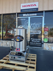 Dragon softwash heater on pallet outside pressure washer supply store, Honda authorized dealer