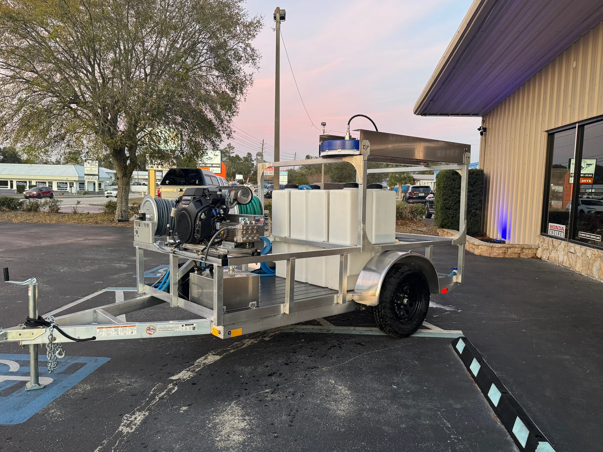 Softwash equipment trailer with tanks and pressure washer for professional cleaning solutions