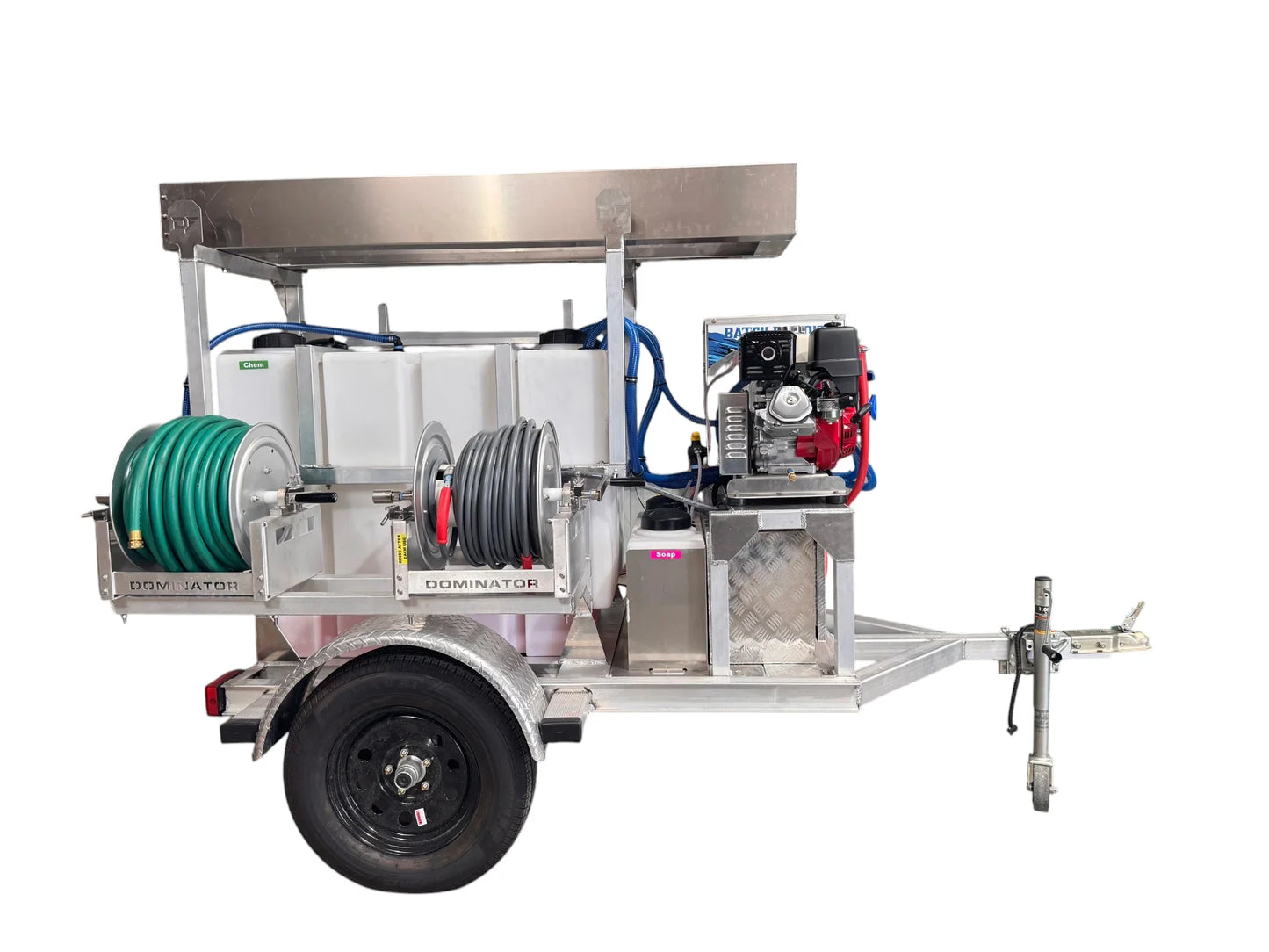 Professional softwash trailer with chemical tanks, hose reels, and pressure washer for exterior cleaning