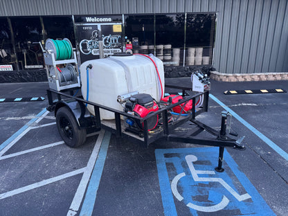 Softwash equipment trailer with Honda engine, hoses, and tank for professional cleaning solutions