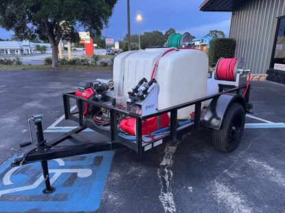 Softwash trailer with Honda engine, chemical tank, and hose reels for exterior cleaning equipment.