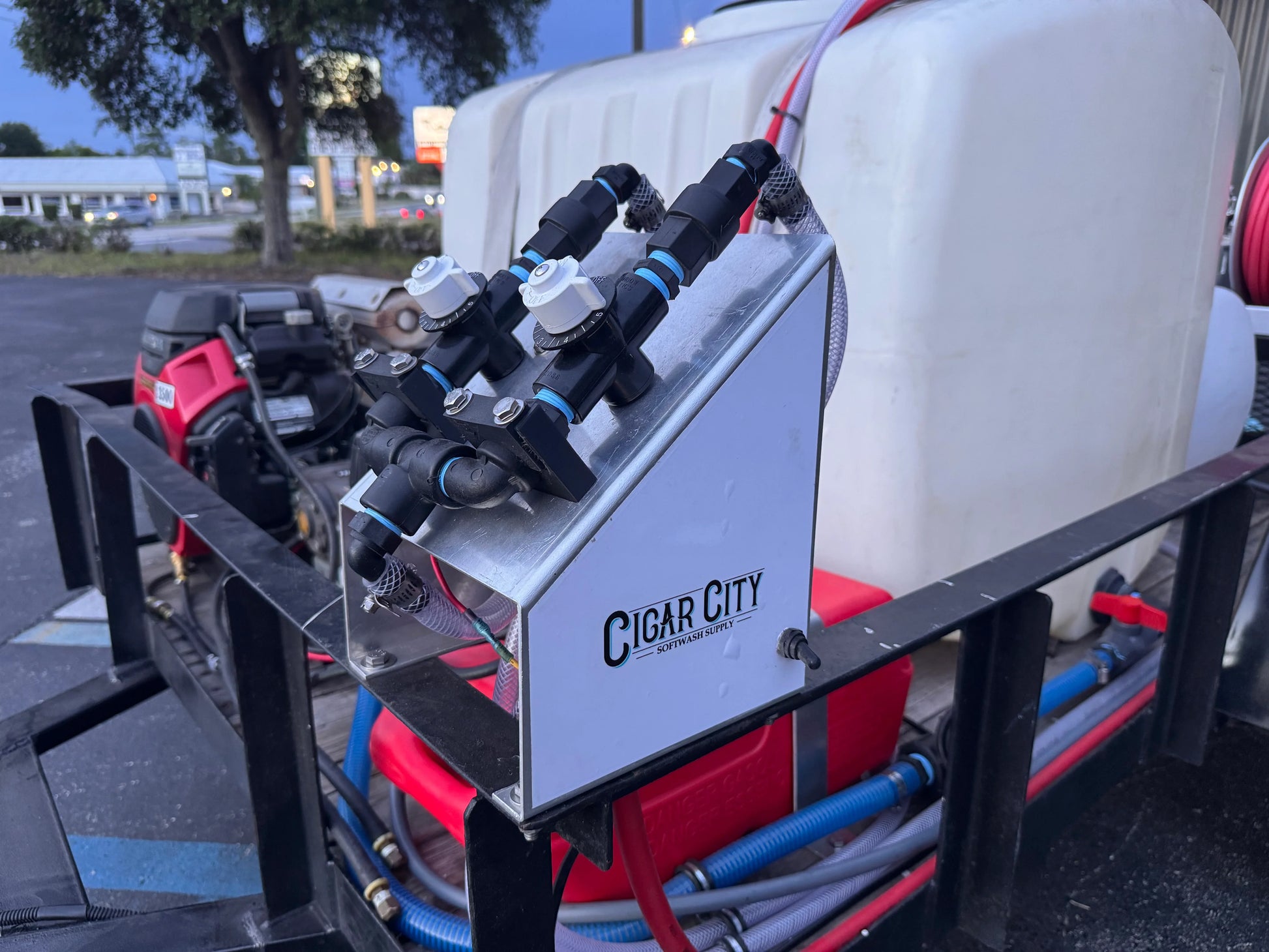 Cigar City Softwash Supply equipment with hoses and valves for professional cleaning solutions