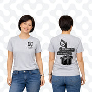Gray softwash supply t-shirt with 'Licensed to Stir Pots' graphic and CC logo, worn by woman