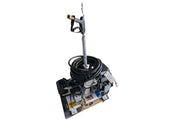 Professional softwash equipment with pressure washer gun, coiled hose, and pump system for exterior cleaning