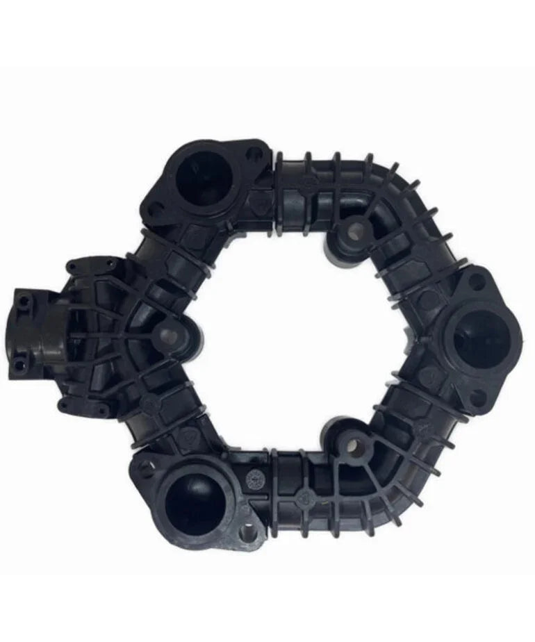 Black plastic softwash manifold with multiple ports and connectors for pressure washing equipment