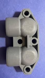 Gray plastic softwash equipment connector with dual ports and mounting holes