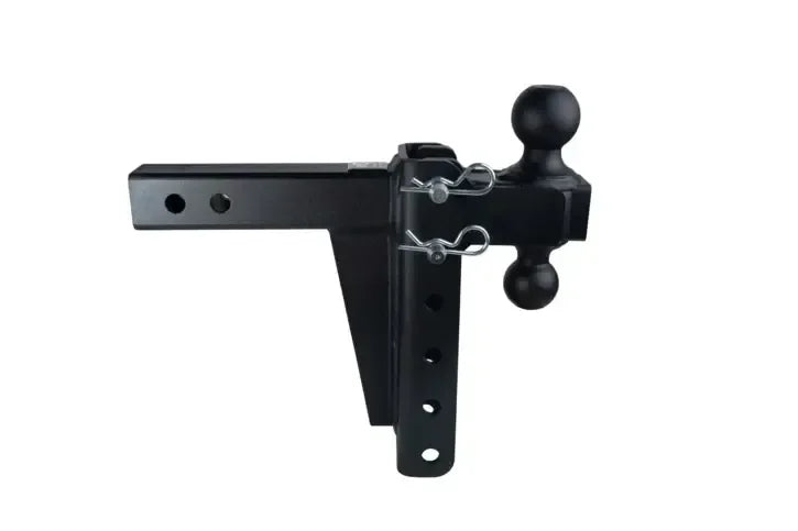 Black dual-ball hitch mount for towing equipment, ideal for softwash truck setups